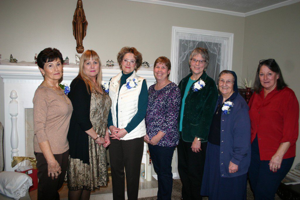 Left to right: Carolina Lorenzana, Nancy Vaughn, Theresa Ward, Ranee Hollinger, Pat Droubay, Sister Germaine, Bobby Earl.
